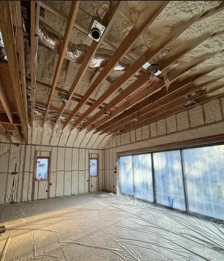 Interior walls and ceiling insulated with spray foam during new construction in Monaca